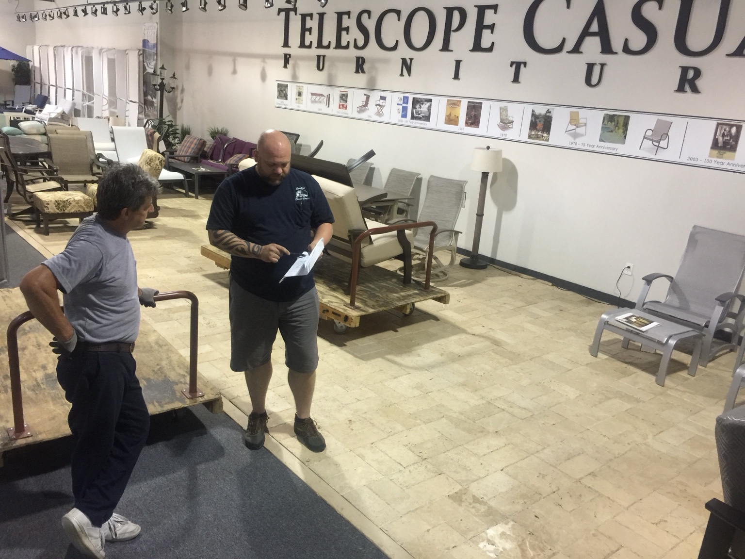 Team discussing showroom installation